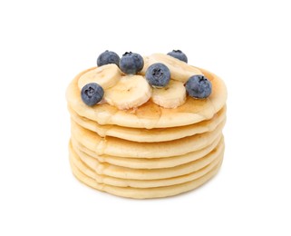Photo of Delicious pancakes with banana slices, blueberries and honey isolated on white