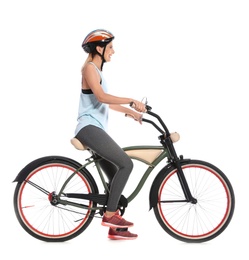 Photo of Portrait of sporty woman with bicycle on white background