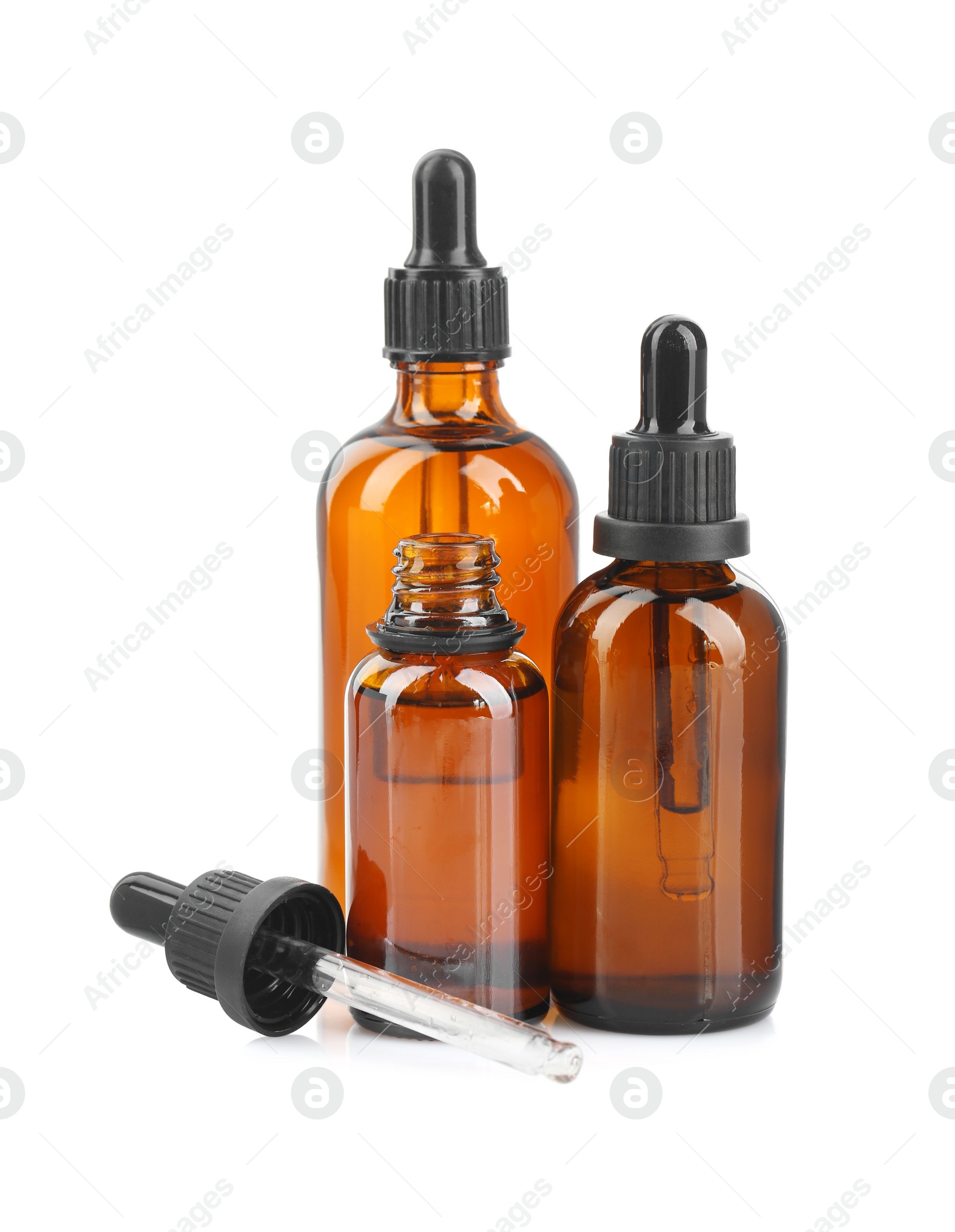 Photo of Glass bottles and pipette with tincture isolated on white