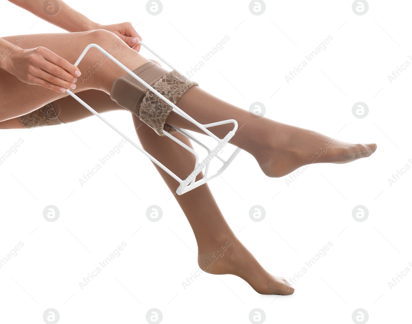 Photo of Woman wearing compression tights with donner on white background, closeup