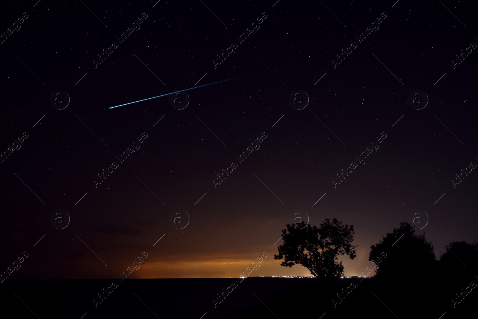 Image of Picturesque view of starry sky at night on seaside