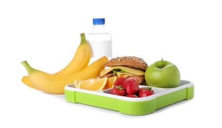 Photo of Lunch box with healthy food for schoolchild on white background