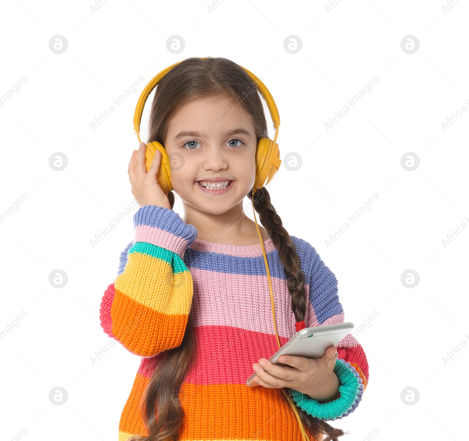 Photo of Cute little child with headphones and mobile phone on white background