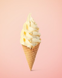 Delicious soft serve vanilla ice cream in crispy cone on pastel pink background