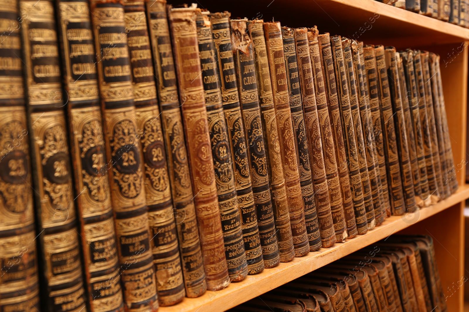 Photo of Collection of old books on shelf in library