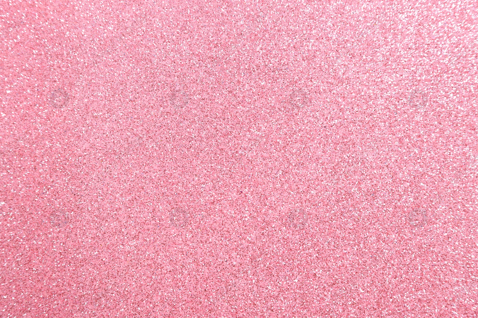 Photo of Beautiful pink shiny glitter as background, top view