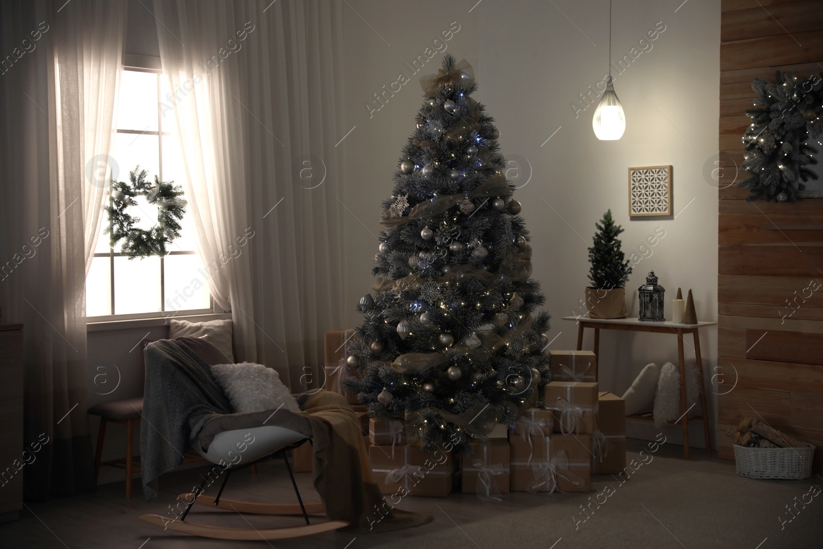 Photo of Beautiful interior of living room with decorated Christmas tree