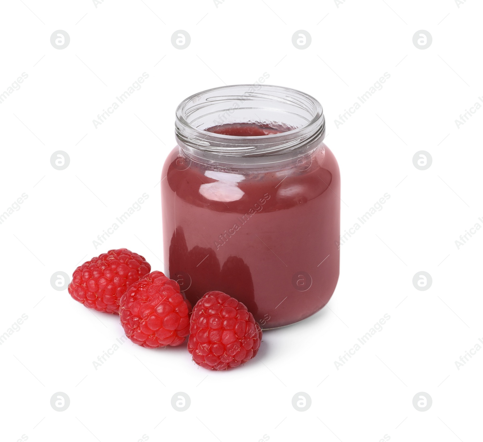 Photo of Jar of healthy baby food and fresh raspberries on white background