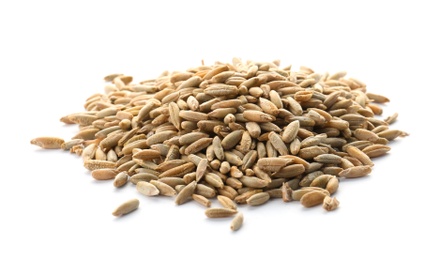 Photo of Raw rye on white background. Healthy grains and cereals