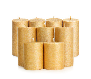 Set of elegant gold candles on white background