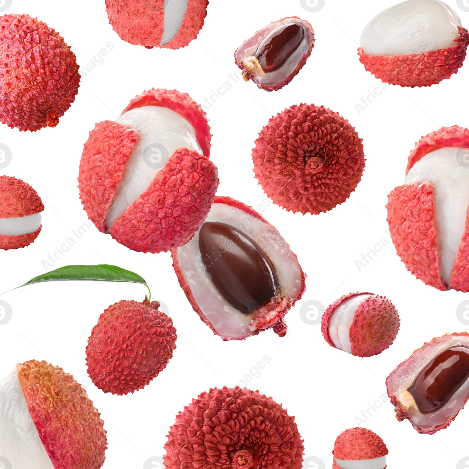 Image of Many lychees falling on white background. Exotic fruit