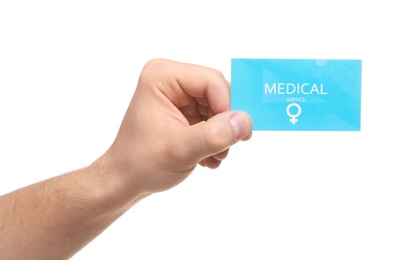 Man holding medical business card isolated on white, closeup. Women's health service