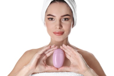 Photo of Young woman with soap bar on white background