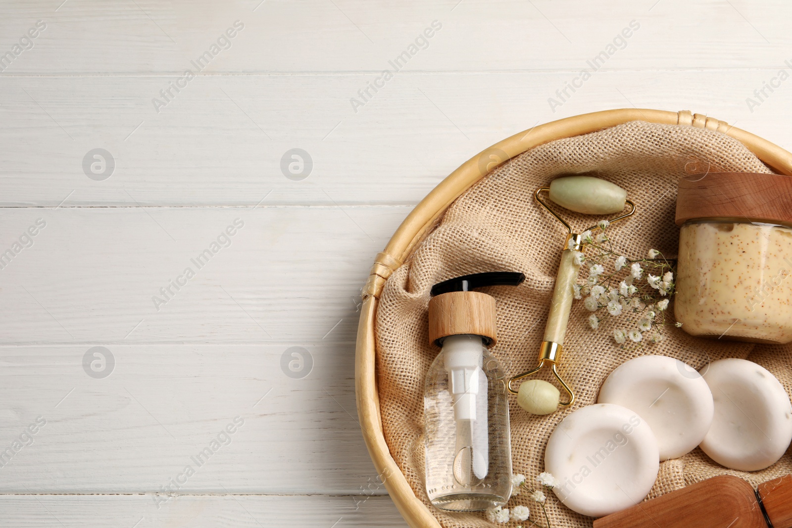 Photo of Spa gift set with personal products on white wooden table, top view. Space for text