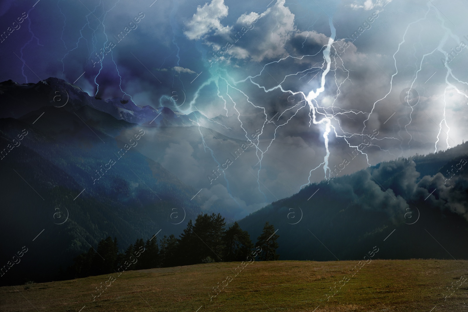 Image of Thunder cloud with lightnings over mountains. Severe weather