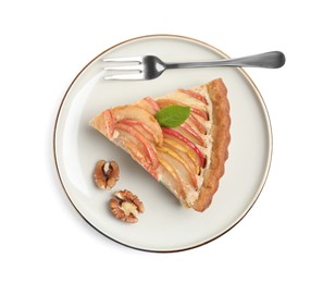 Photo of Delicious apple pie with fork and walnuts on white background, top view