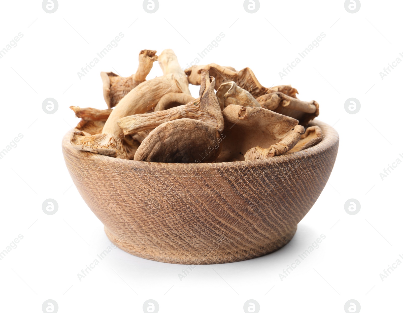 Photo of Bowl of dried mushrooms isolated on white