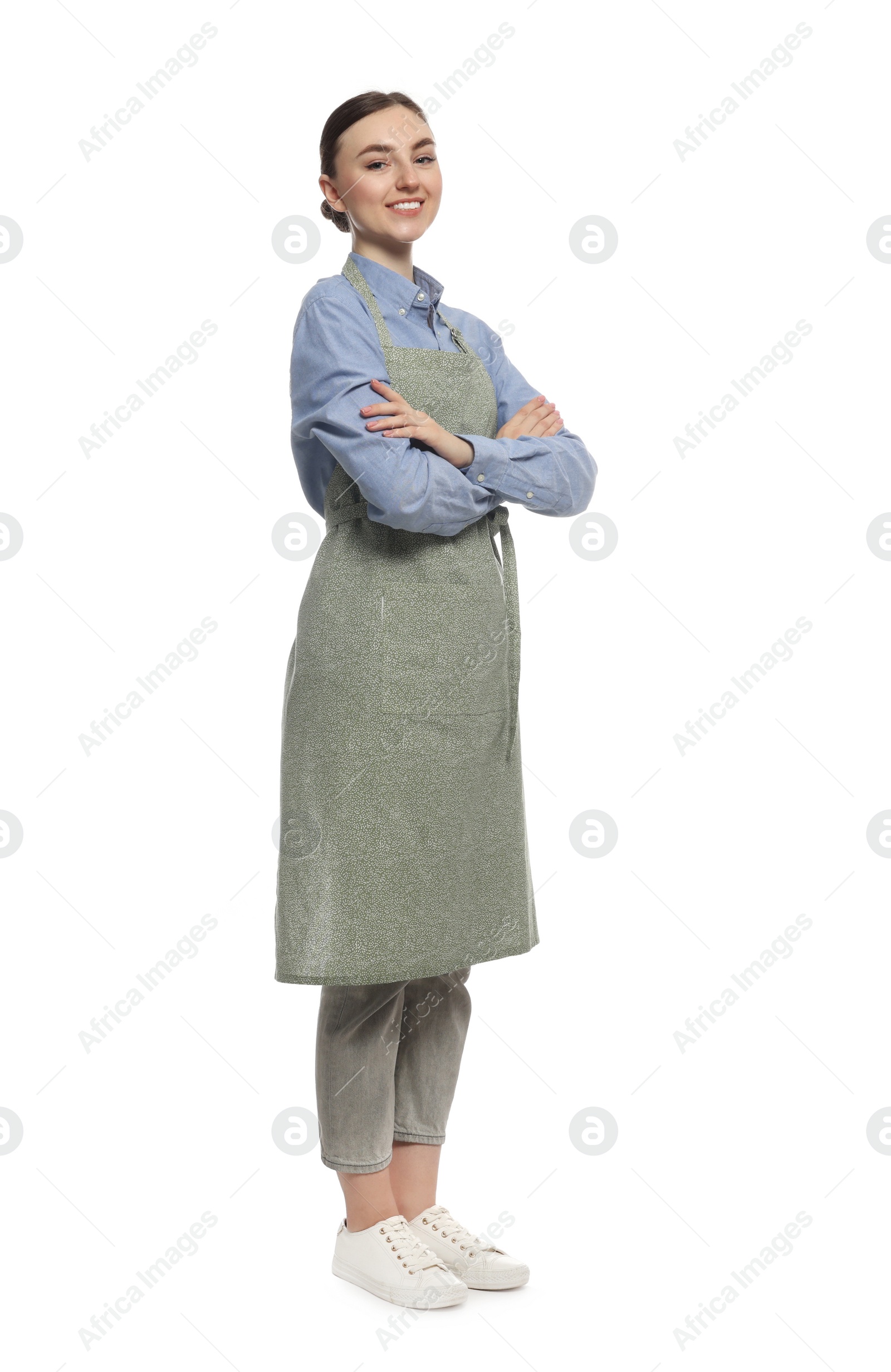 Photo of Beautiful young woman in clean apron on white background