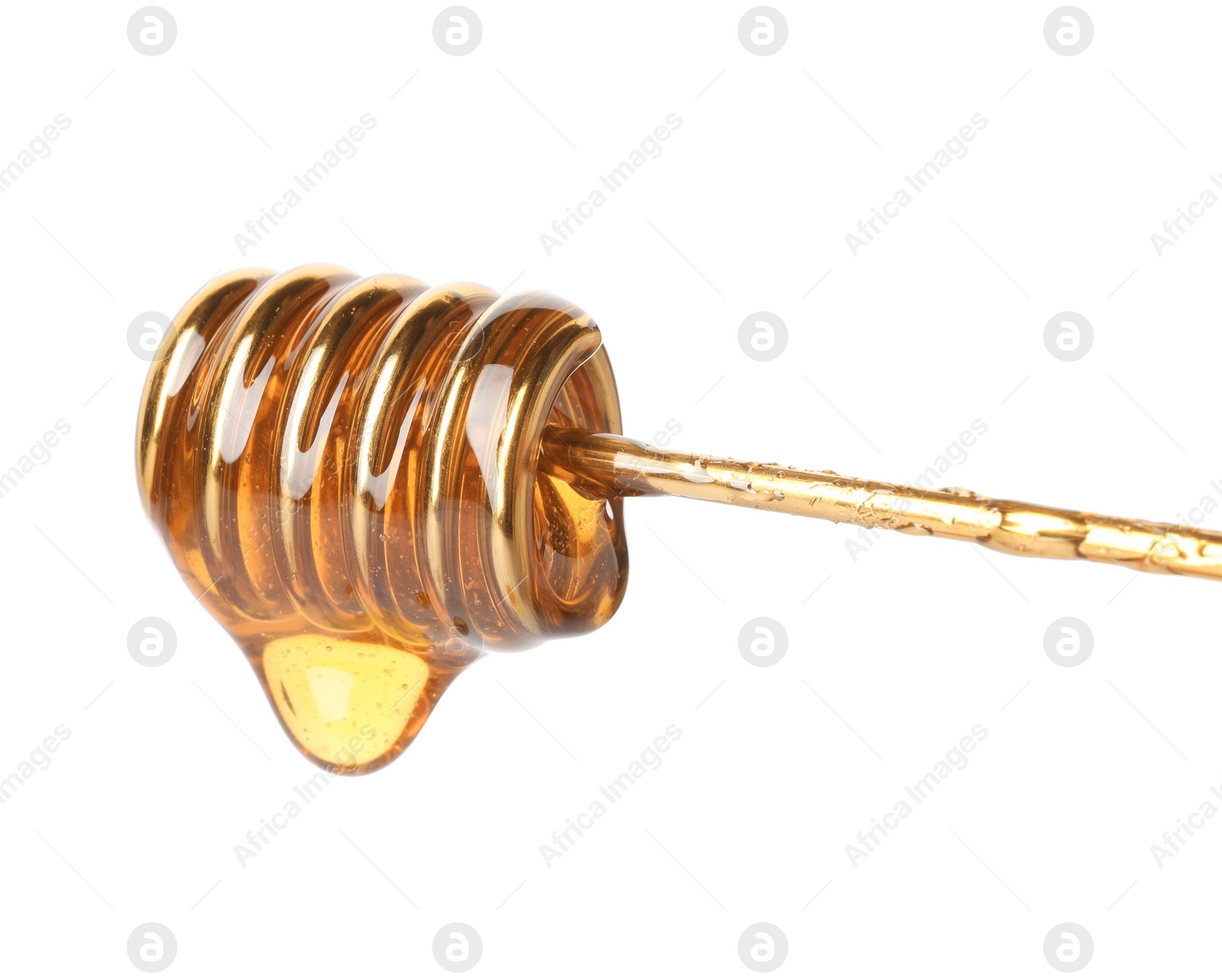 Photo of Honey dripping from dipper on white background