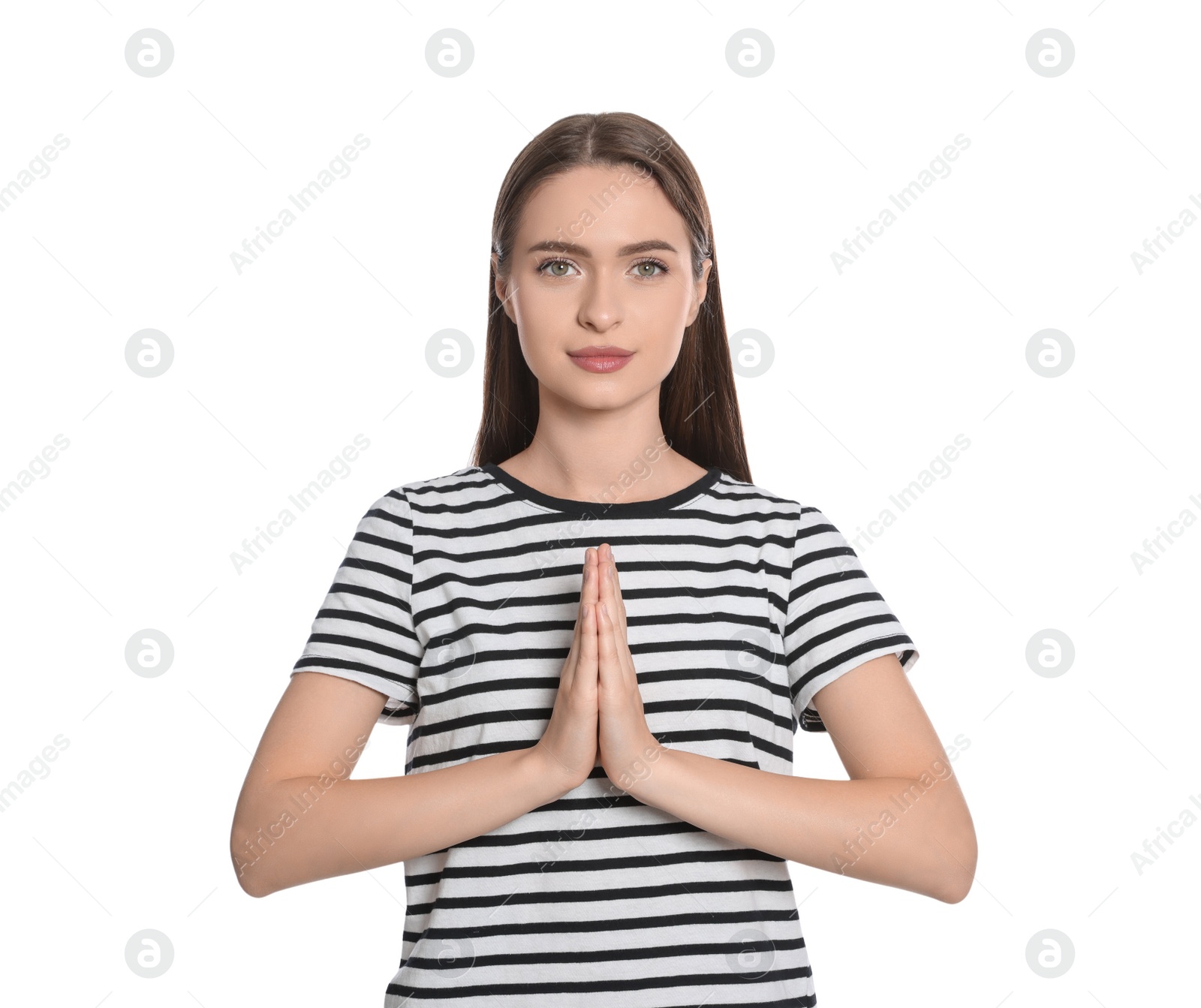 Photo of Woman with clasped hands praying on white background
