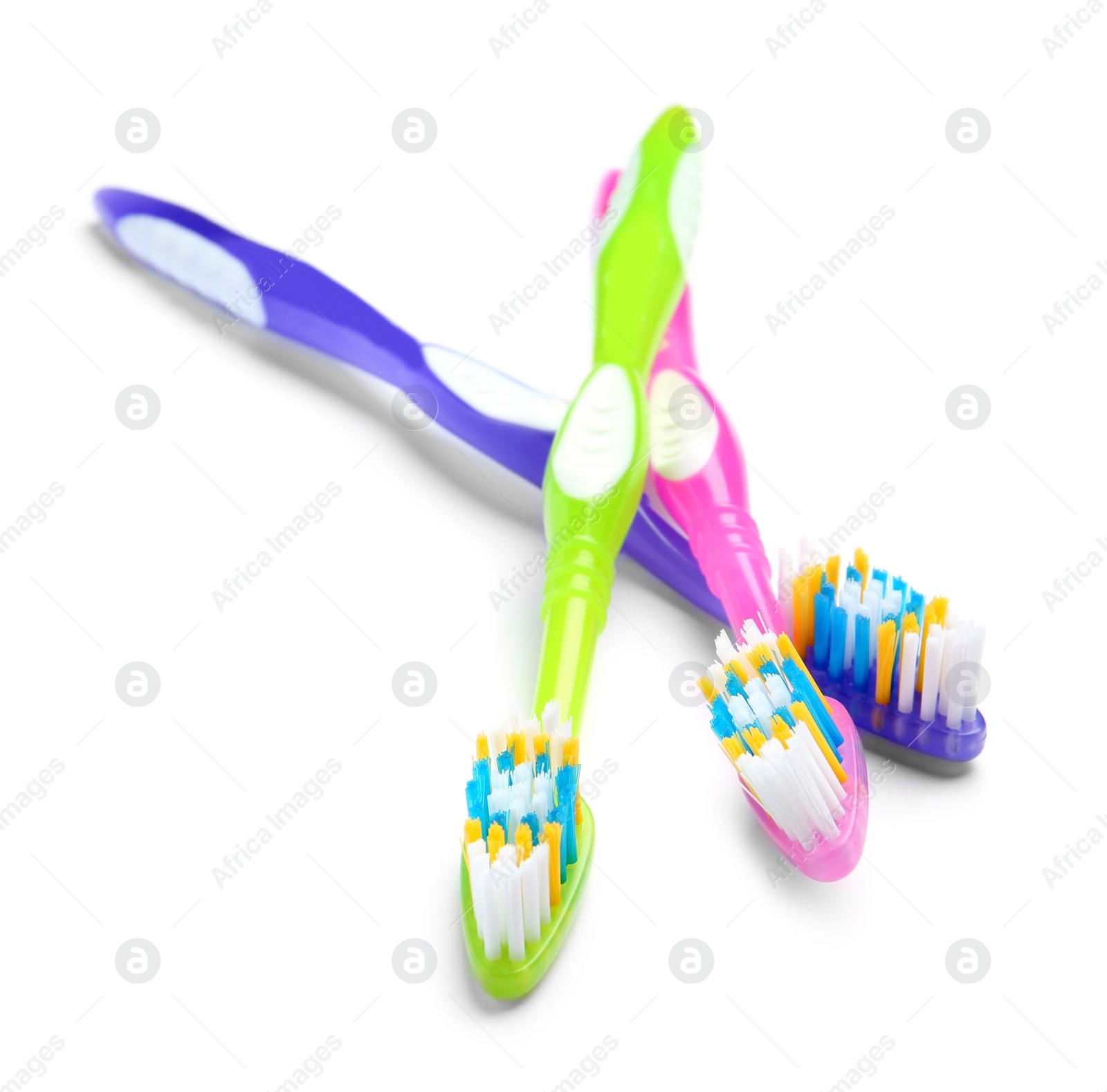 Photo of Color toothbrushes on white background. Dental care