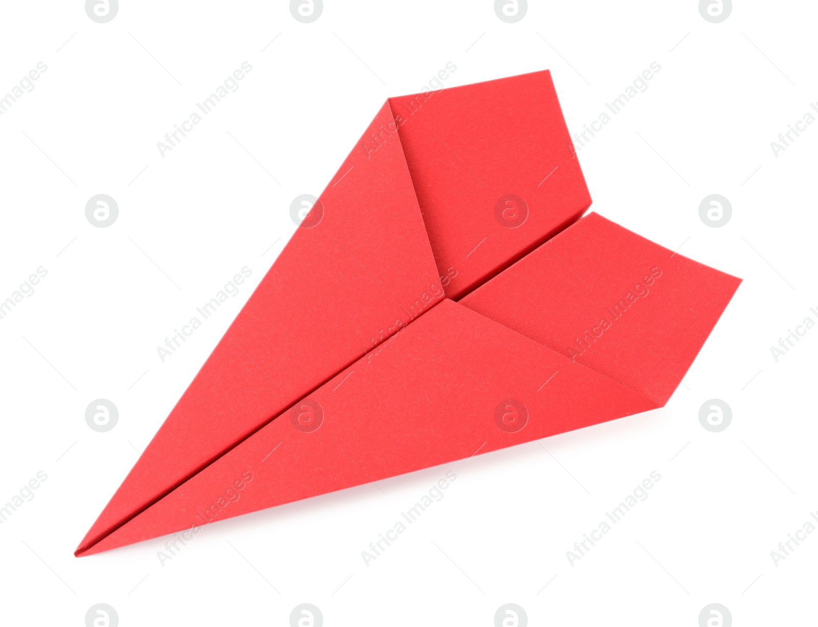 Photo of Handmade red paper plane isolated on white