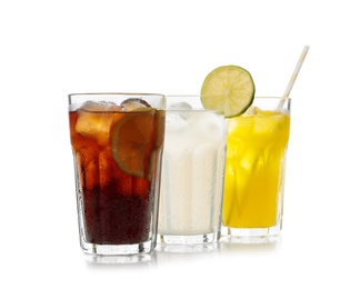 Photo of Delicious refreshing drinks in glasses on white background