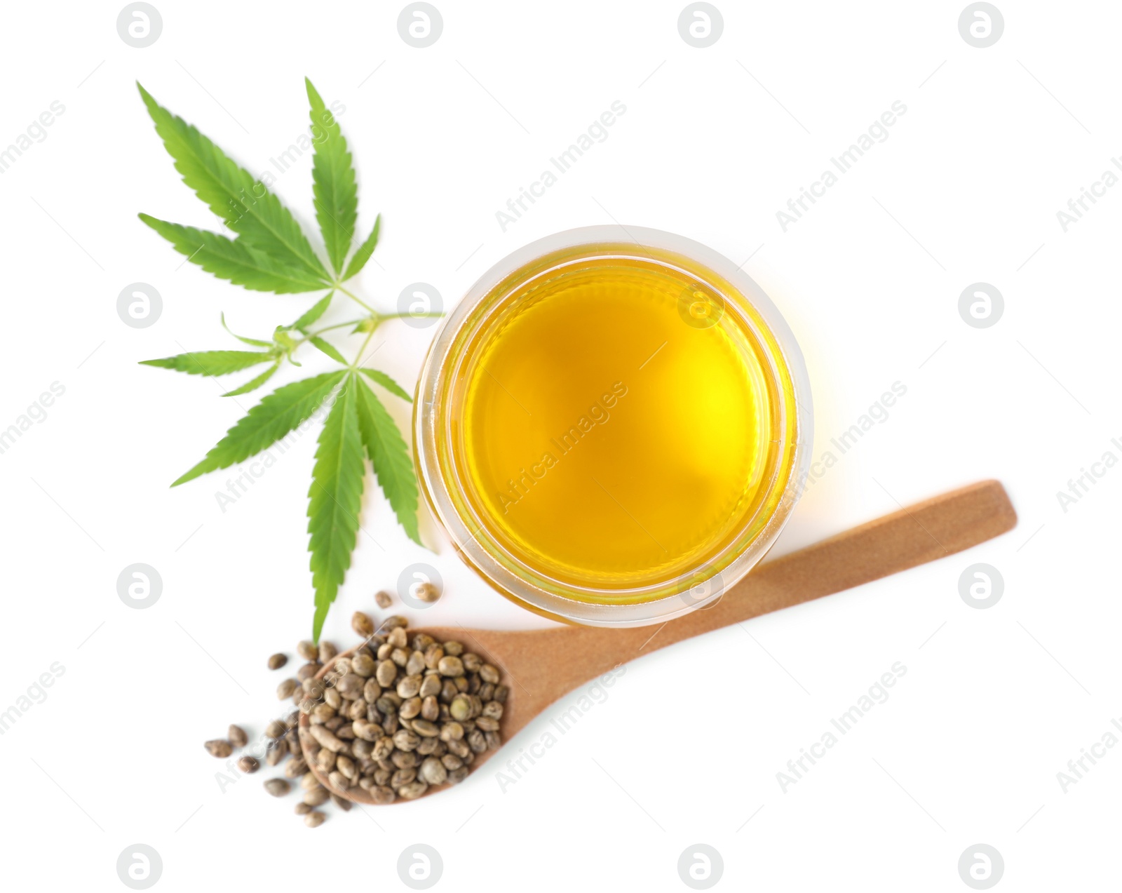 Photo of Hemp oil, fresh leaves and seeds on white background, top view