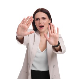 Beautiful young businesswoman in suit on white background