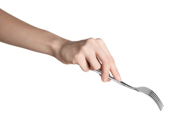 Woman holding shiny silver fork on white background, closeup