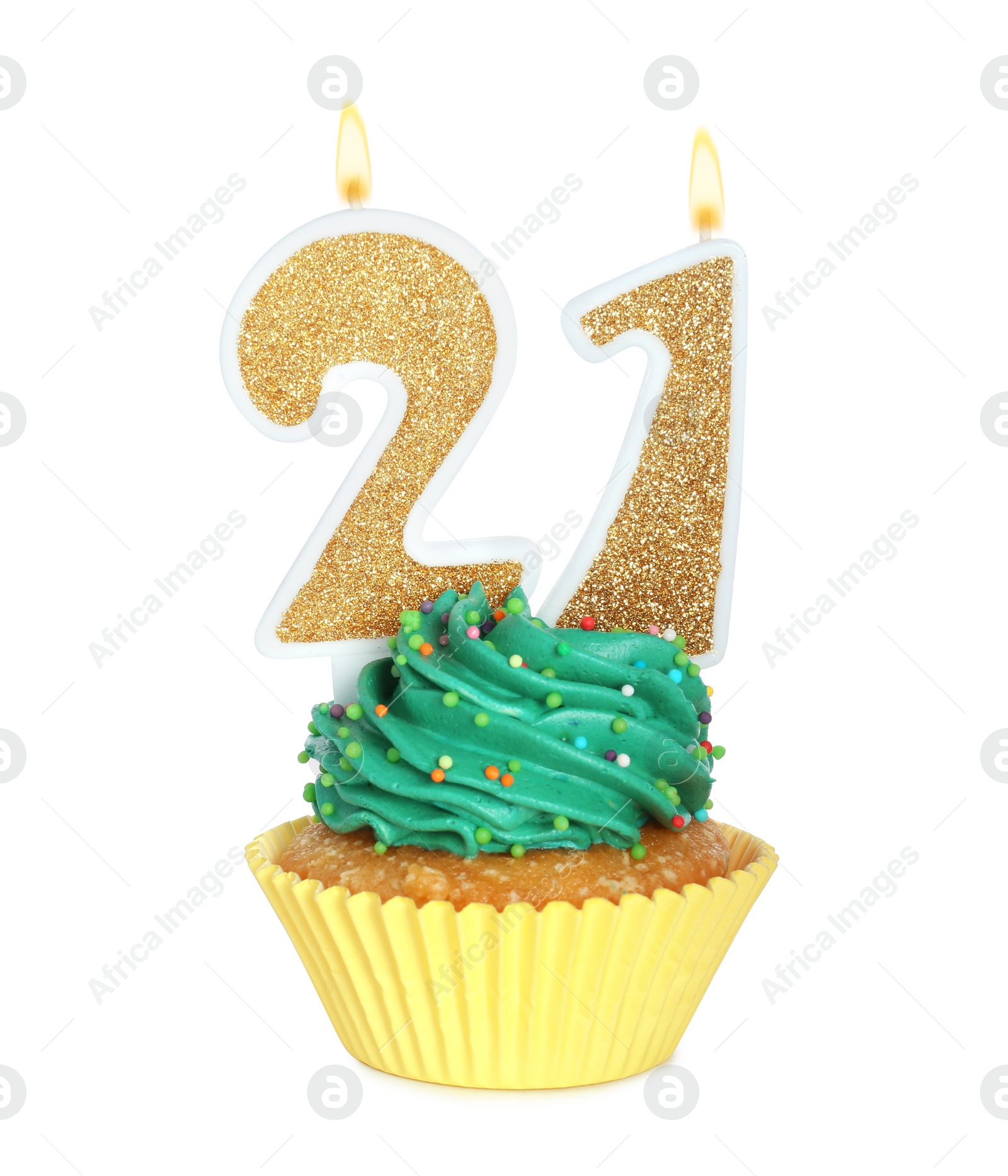 Photo of 21th birthday. Delicious cupcake with number shaped candles for coming of age party on white background