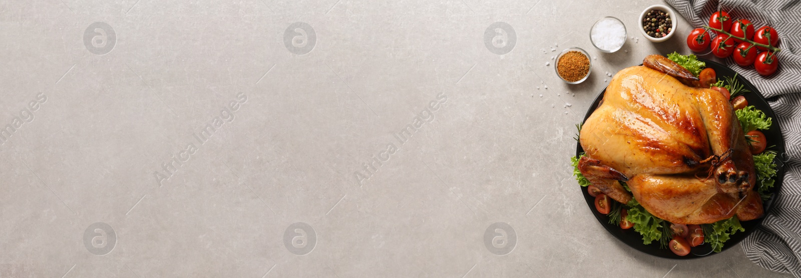 Image of Tasty turkey and space for text on grey table, flat lay. Banner design