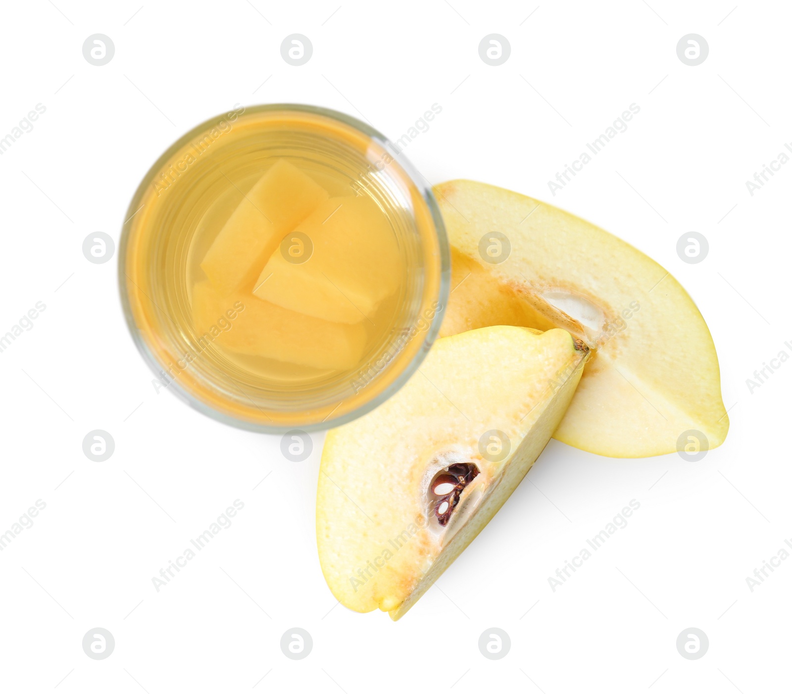 Photo of Delicious quince drink in glass and fresh fruit isolated on white, top view