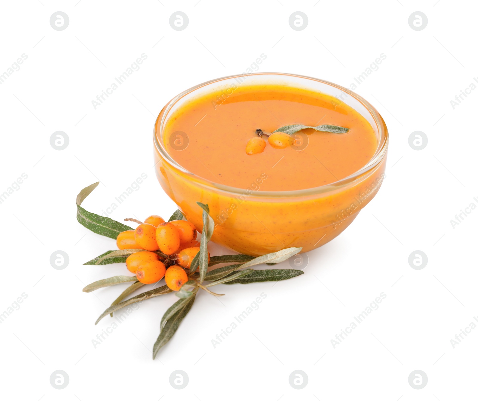 Photo of Delicious sea buckthorn jam in bowl and fresh berries on white background