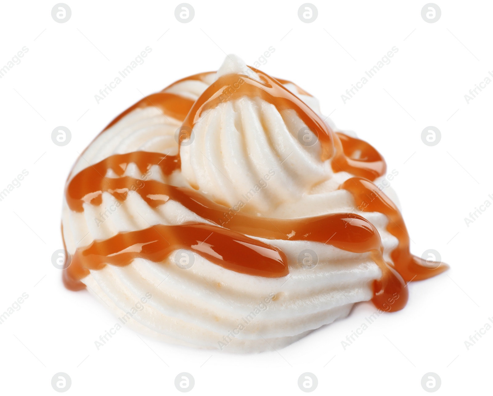 Photo of Delicious fresh whipped cream with caramel sauce isolated on white