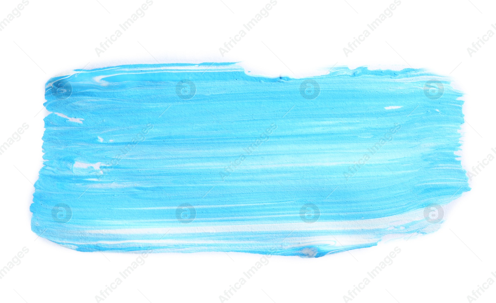 Photo of Abstract brushstroke of blue paint isolated on white