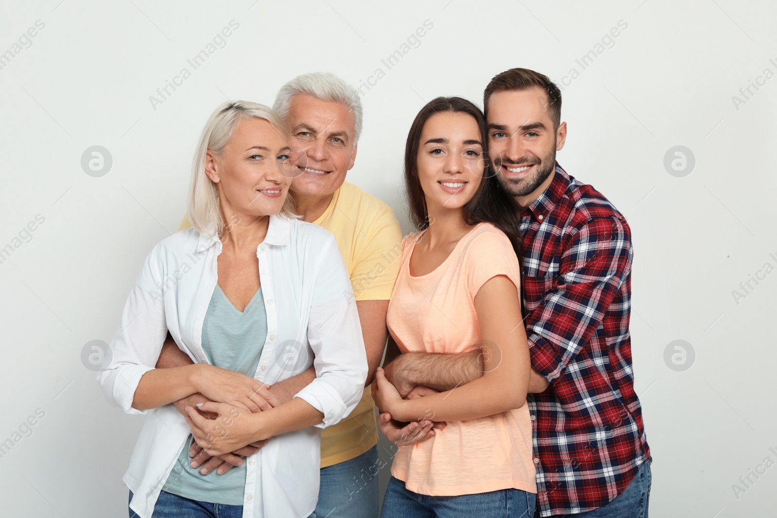 Photo of Portrait of happy family on white background