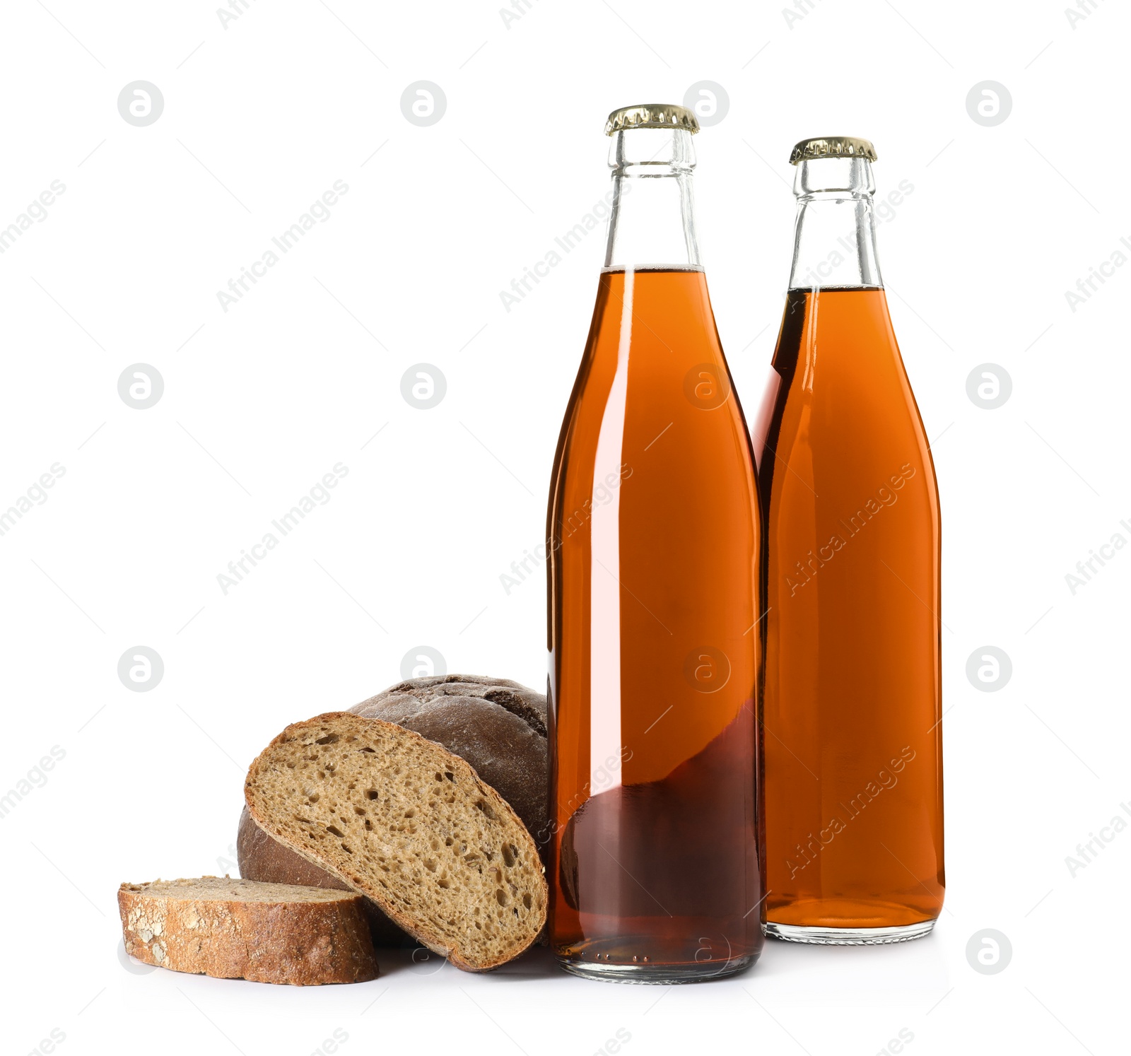 Photo of Bottles of delicious fresh kvass and bread isolated on white