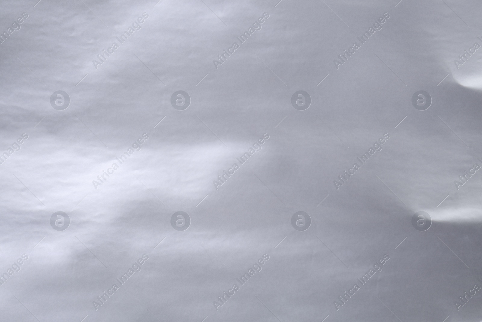 Photo of Closeup view of silver surface as background