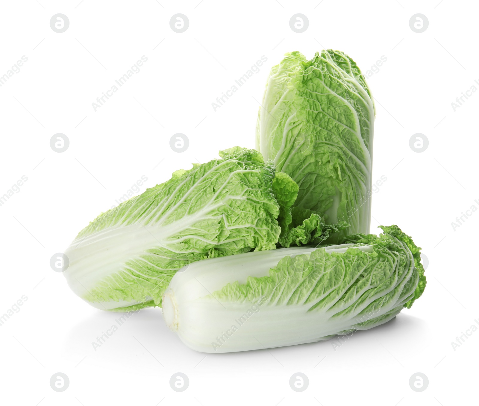 Photo of Fresh ripe cabbages on white background