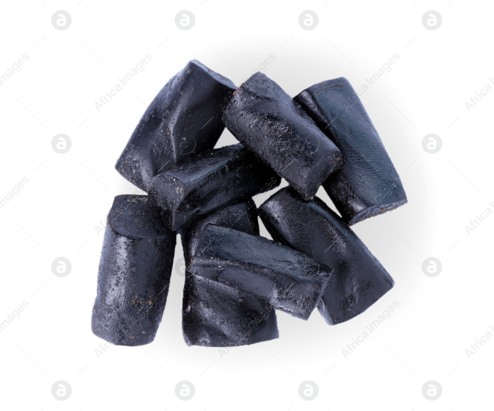 Photo of Tasty liquorice candies isolated on white, top view