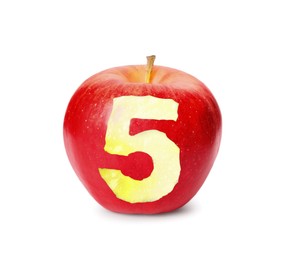Red apple with carved number five as school grade on white background