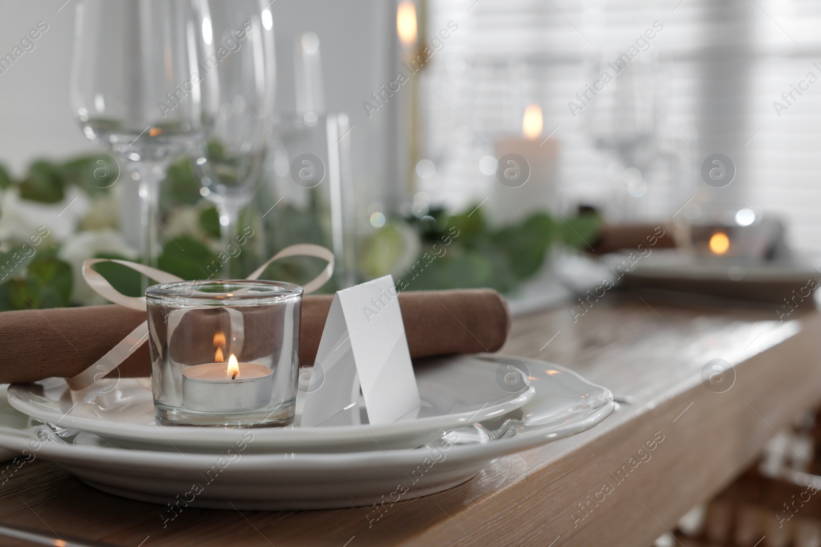 Photo of Festive table setting with beautiful tableware and decor, closeup