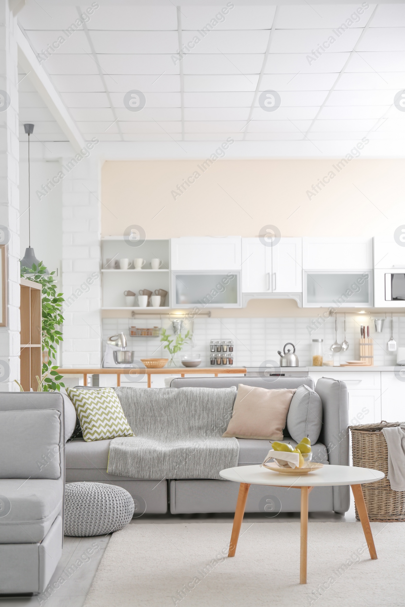 Photo of Stylish apartment interior with modern kitchen. Idea for home design