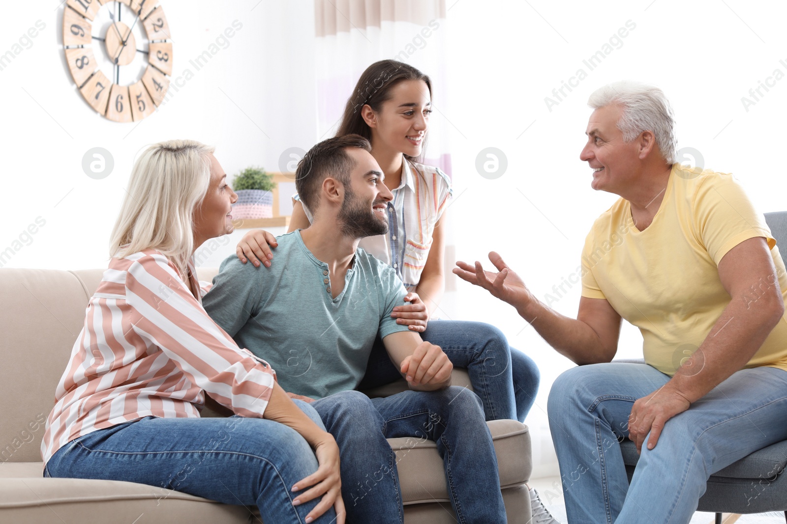 Photo of Happy family at home. Reunion of generations