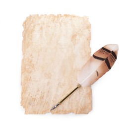 Photo of Feather pen and parchment on white background, top view