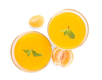 Delicious tangerine jelly with mint on white background, top view
