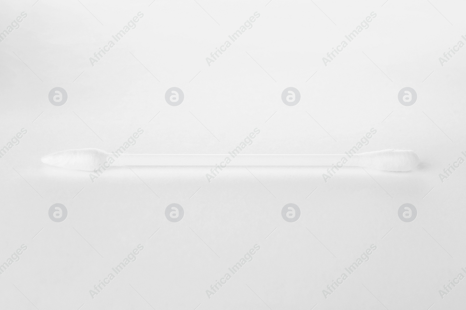 Photo of One clean cotton bud isolated on white