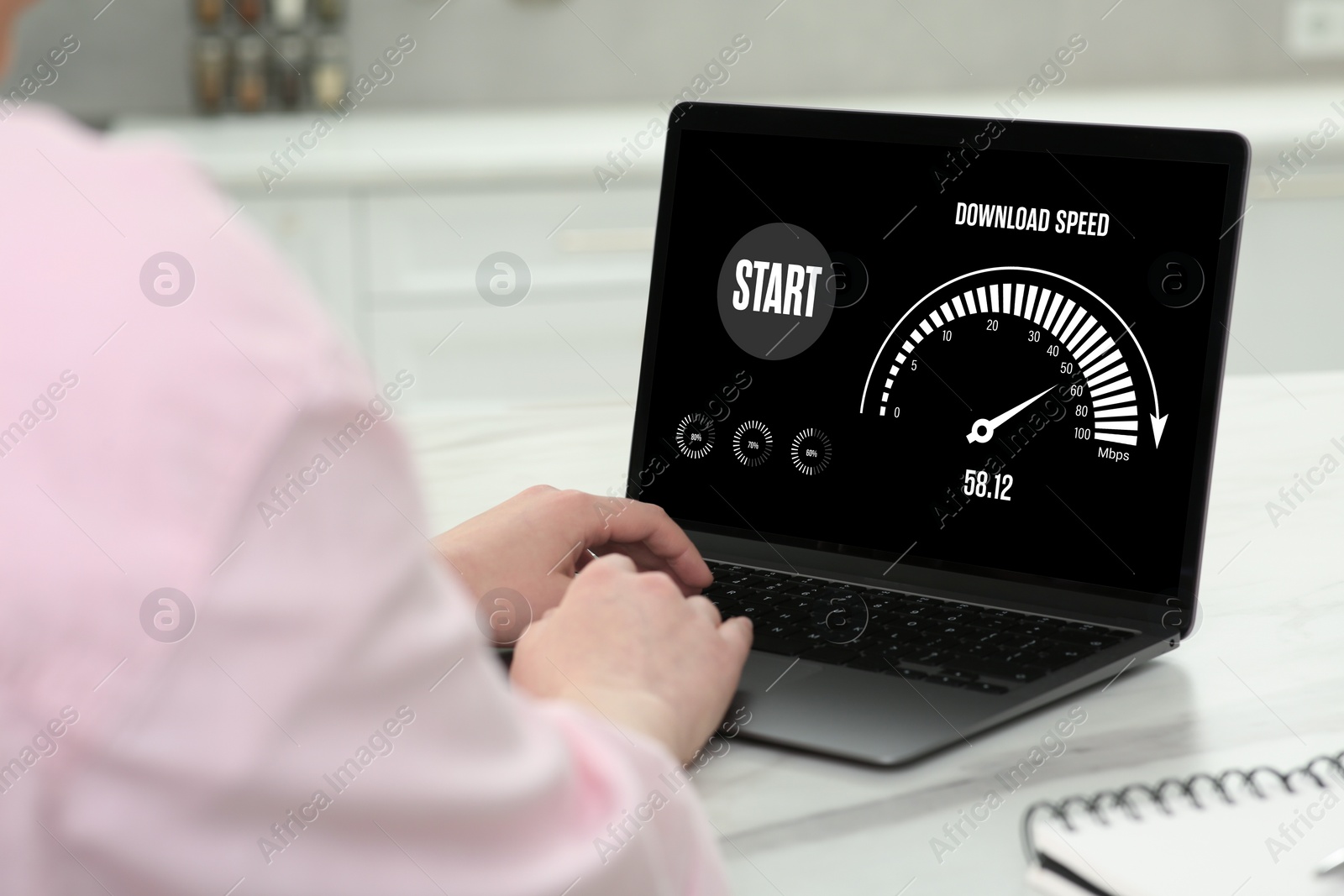 Image of Speed test. Woman using laptop at table, closeup