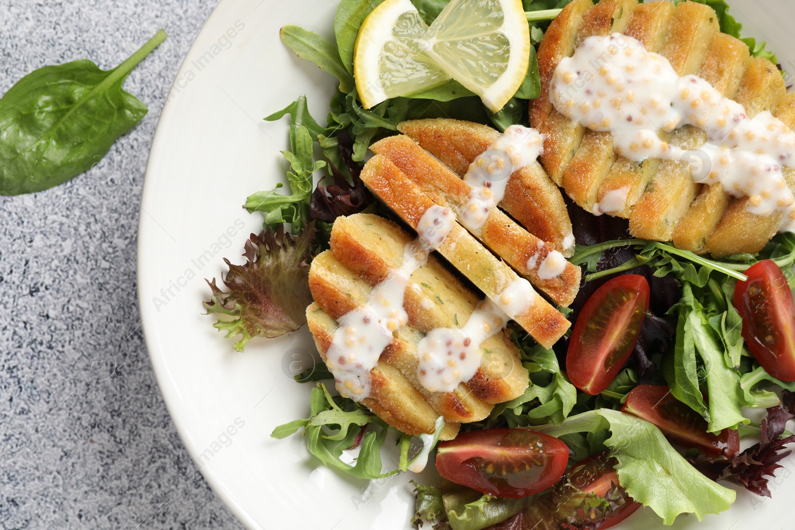 Photo of Healthy dish high in vegetable fats on light textured table, top view